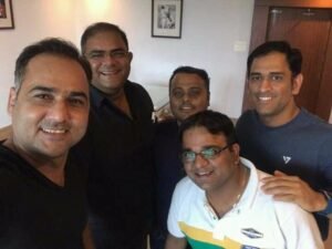 dhoni with mihar diwakar